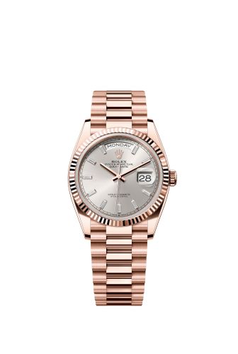 Rolex 128235-0087 : Day-Date 36 Everose Gold - Fluted / Silver - Baguette