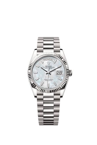 Rolex 128239-0065 : Day-Date 36 White Gold - Fluted / MOP - Baguette / President